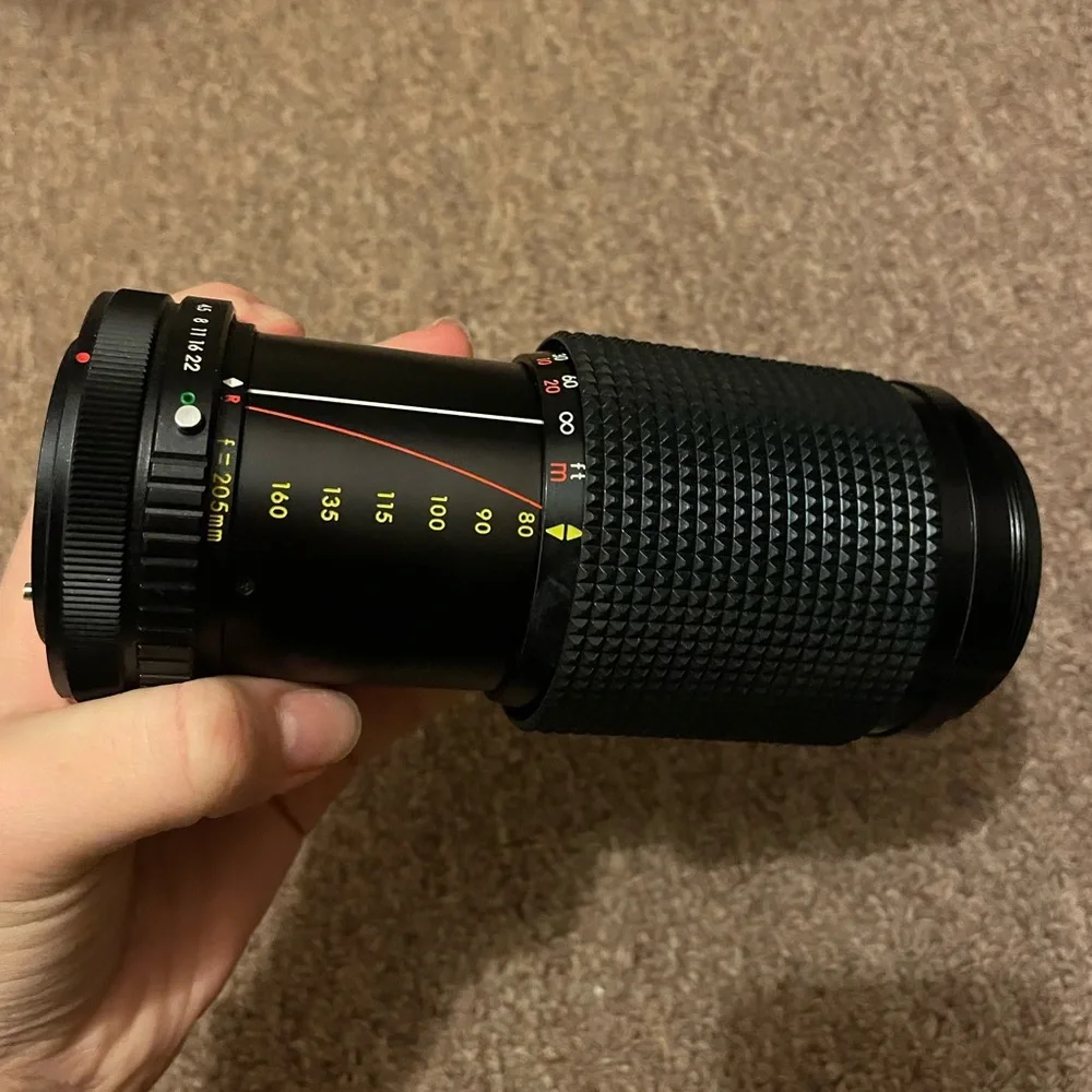 auto rakunar camera lens with hoya 52mm lens